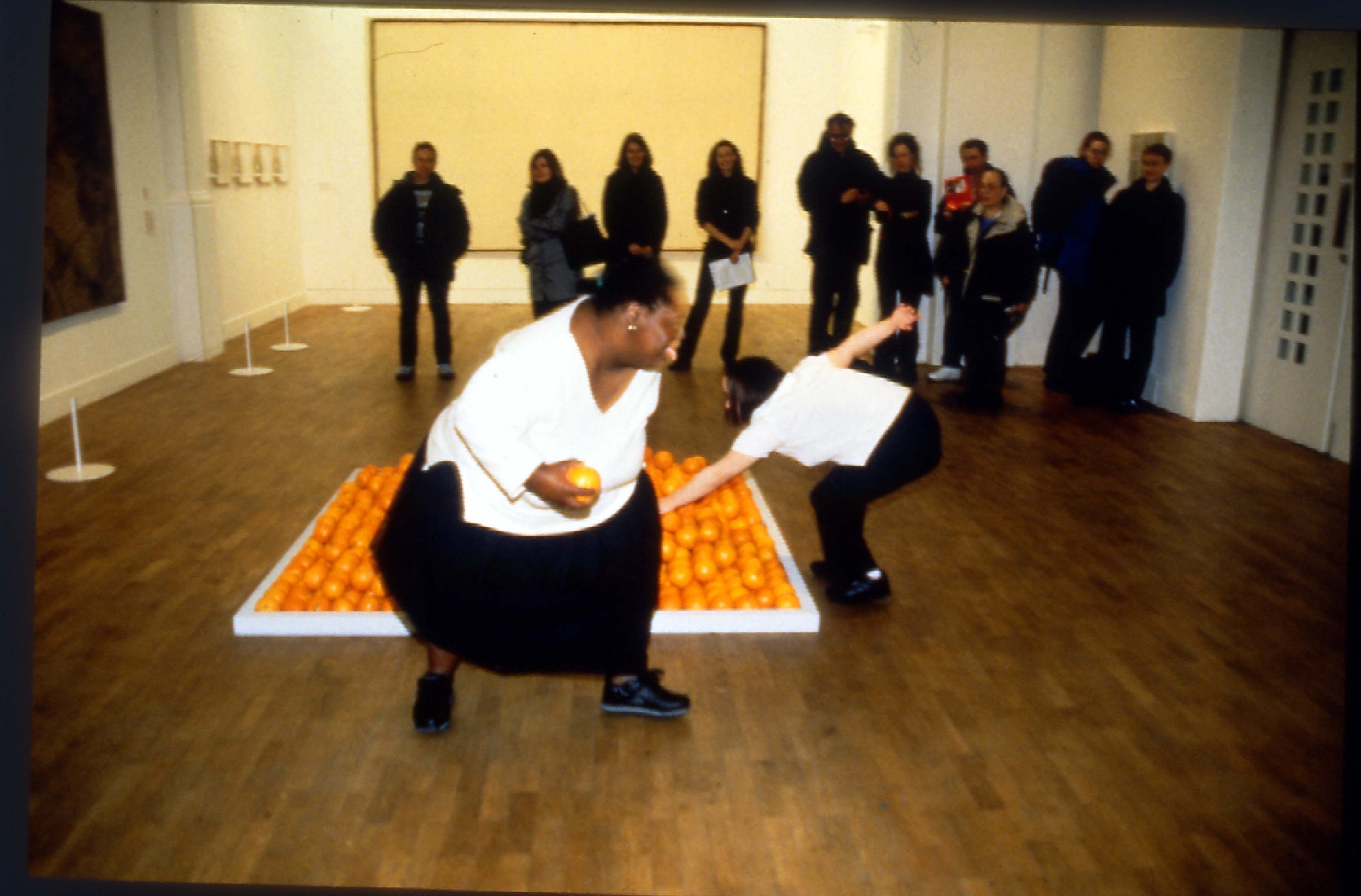 Photo of Natalie dancing with an orange at Whitechapel Art Gallery